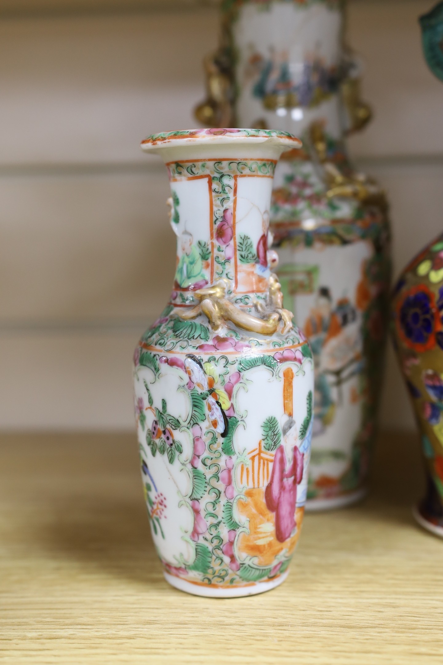 A group of 19th / 20th century Chinese vases and a figure of Guanyin, tallest 25cm